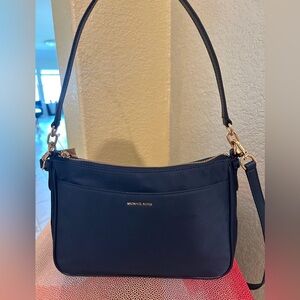Michael Kors Navy Pouch with Gold Accents